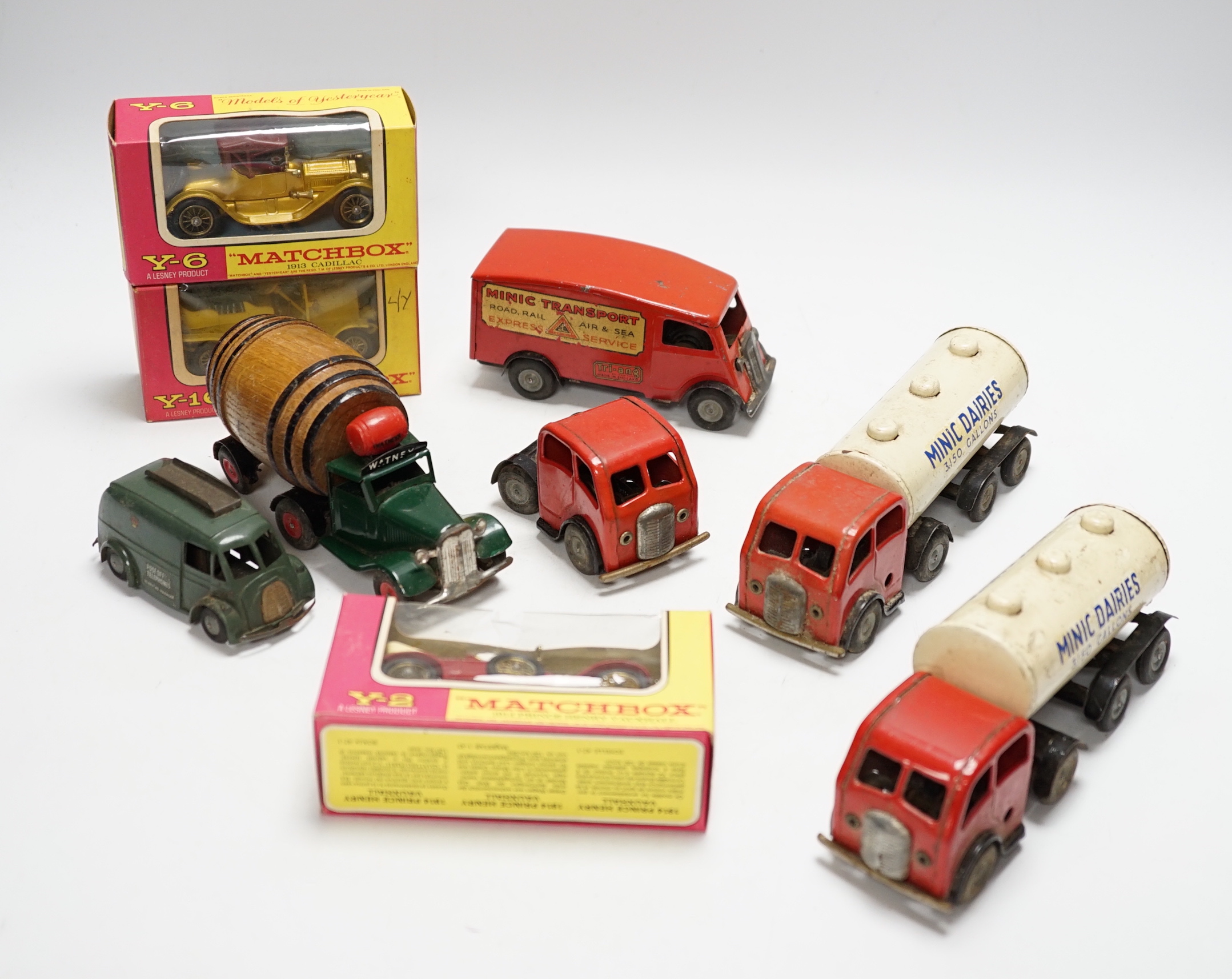 Collection of Tri-ang Minic tinplate vehicles and Matchbox diecast vehicles including ten Tri-ang Minic clockwork vehicles; two Milk Tankers, two Standard Vanguards, a Riley Police Car, a Brewery Tanker, a Minic Transpor